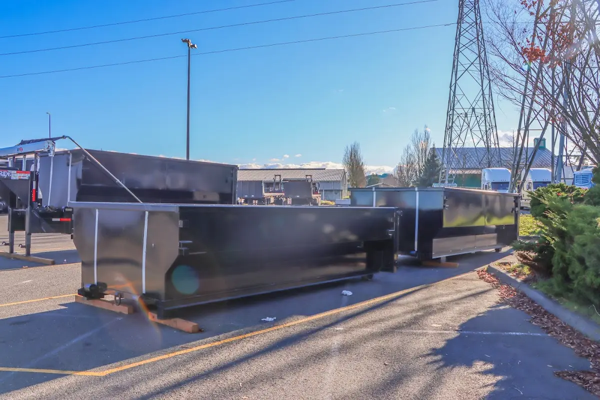 Roll-off dumpster ready for waste disposal at job site for Concrete Dumpster Rental in Westwego